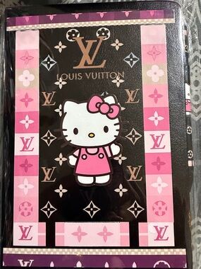 Pink and black HK journal with matching pen.